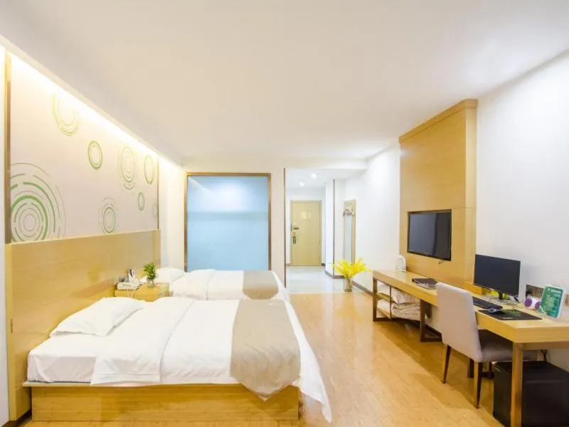 Bed in GreenTree Inn Xingxincheng Town Jiayuan Central Plaza Business Hotel