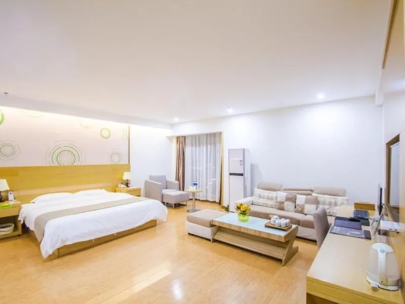 Bed in GreenTree Inn Xingxincheng Town Jiayuan Central Plaza Business Hotel