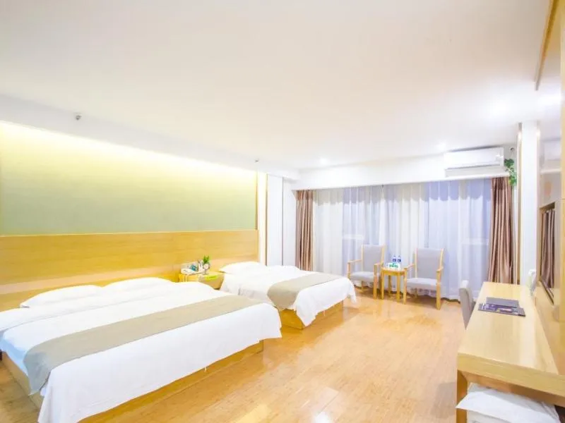 Bed in GreenTree Inn Xingxincheng Town Jiayuan Central Plaza Business Hotel
