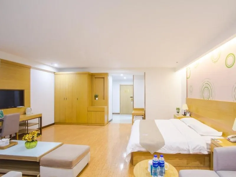 Bed in GreenTree Inn Xingxincheng Town Jiayuan Central Plaza Business Hotel
