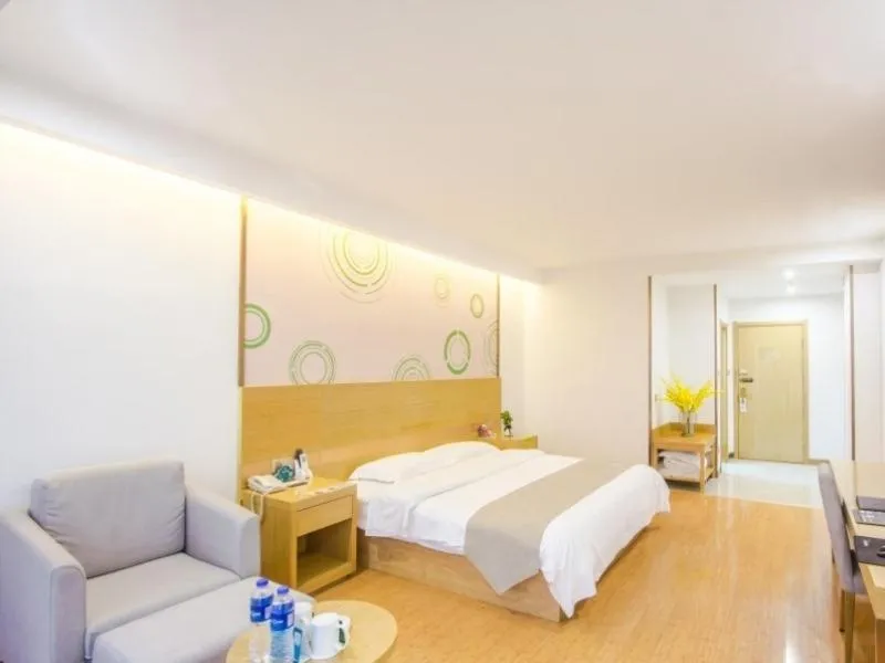 Bed in GreenTree Inn Xingxincheng Town Jiayuan Central Plaza Business Hotel