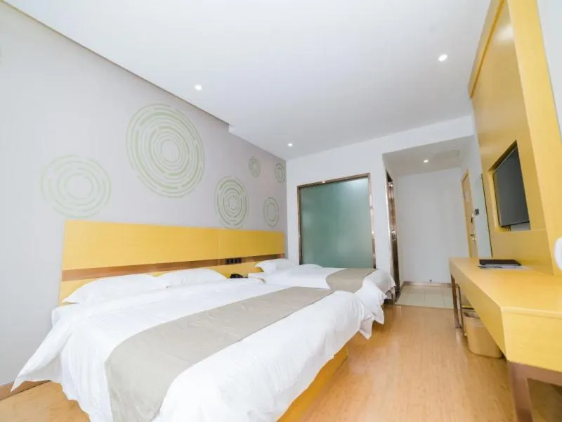 Bed in GreenTree Inn Suzhou Zhangjiagang City Jingang Town Express Hotel