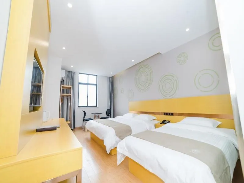 Bed in GreenTree Inn Suzhou Zhangjiagang City Jingang Town Express Hotel