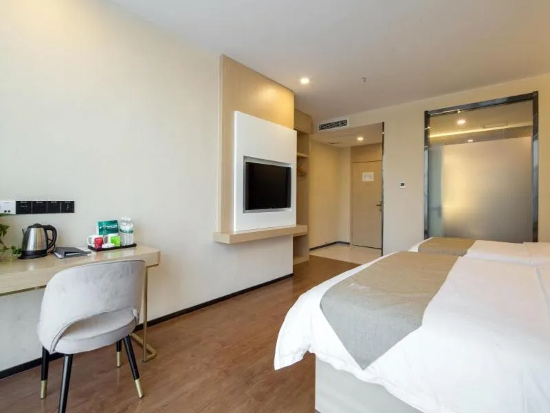 Bed in GreenTree Qindao Chengyang Zhengyang Middle Road Wanda Hotel