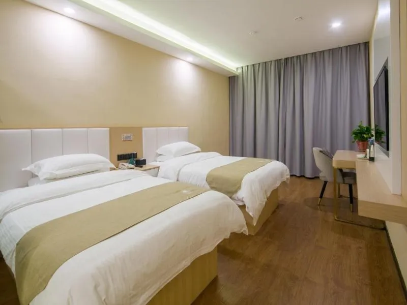 Bed in GreenTree Qindao Chengyang Zhengyang Middle Road Wanda Hotel