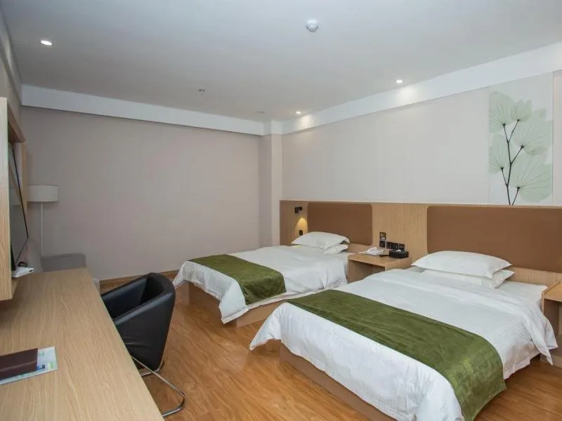 Bed in GreenTree Inn Lu'an Kaihong Plaza Express Hotel