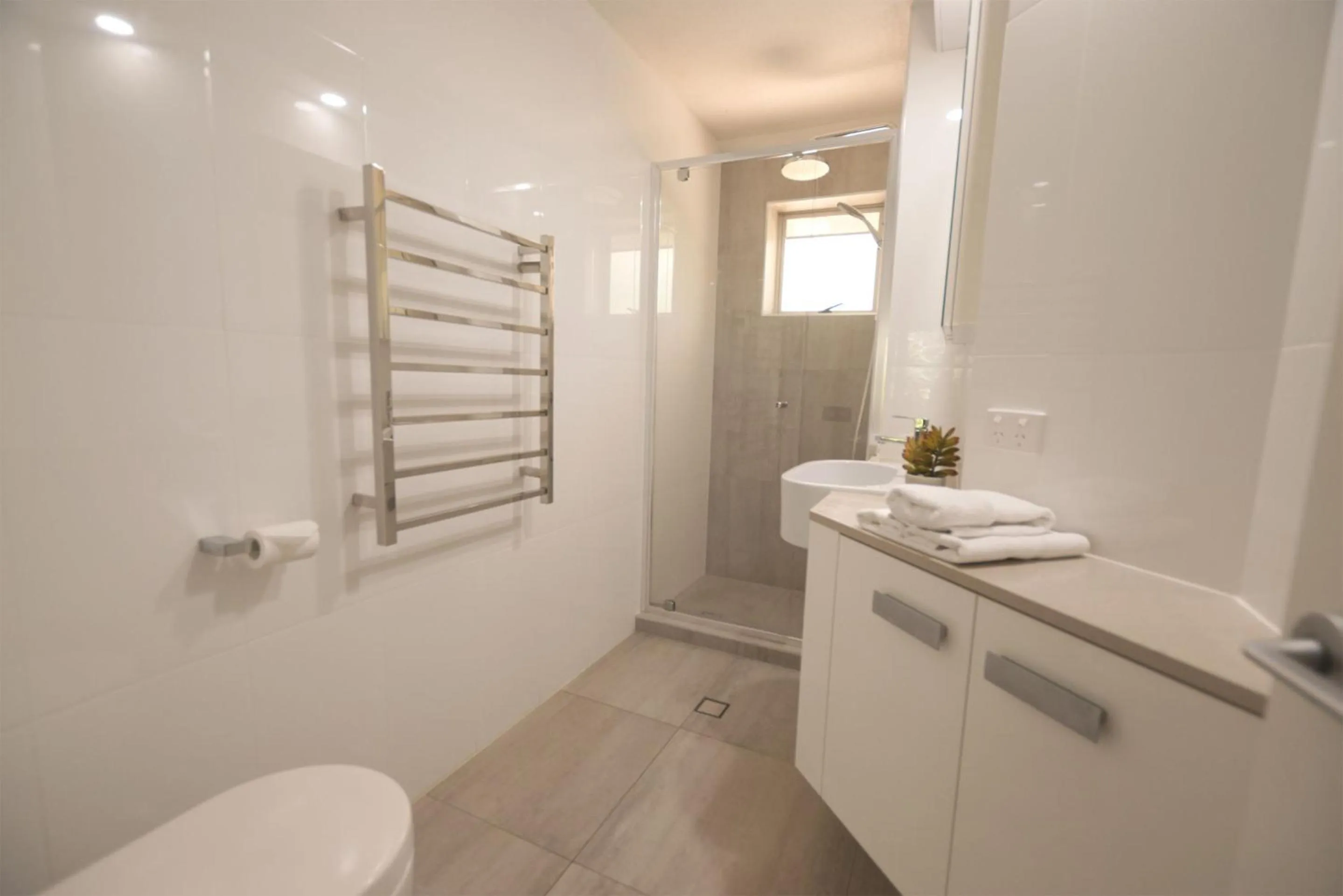 Bathroom in Raintrees Moffat Beach