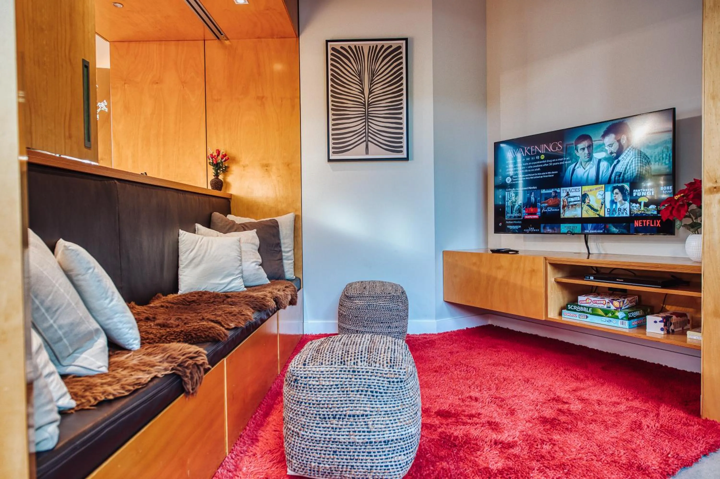 Communal lounge/ TV room in Award-Winning Modern Retreat with Hot Tub & Views