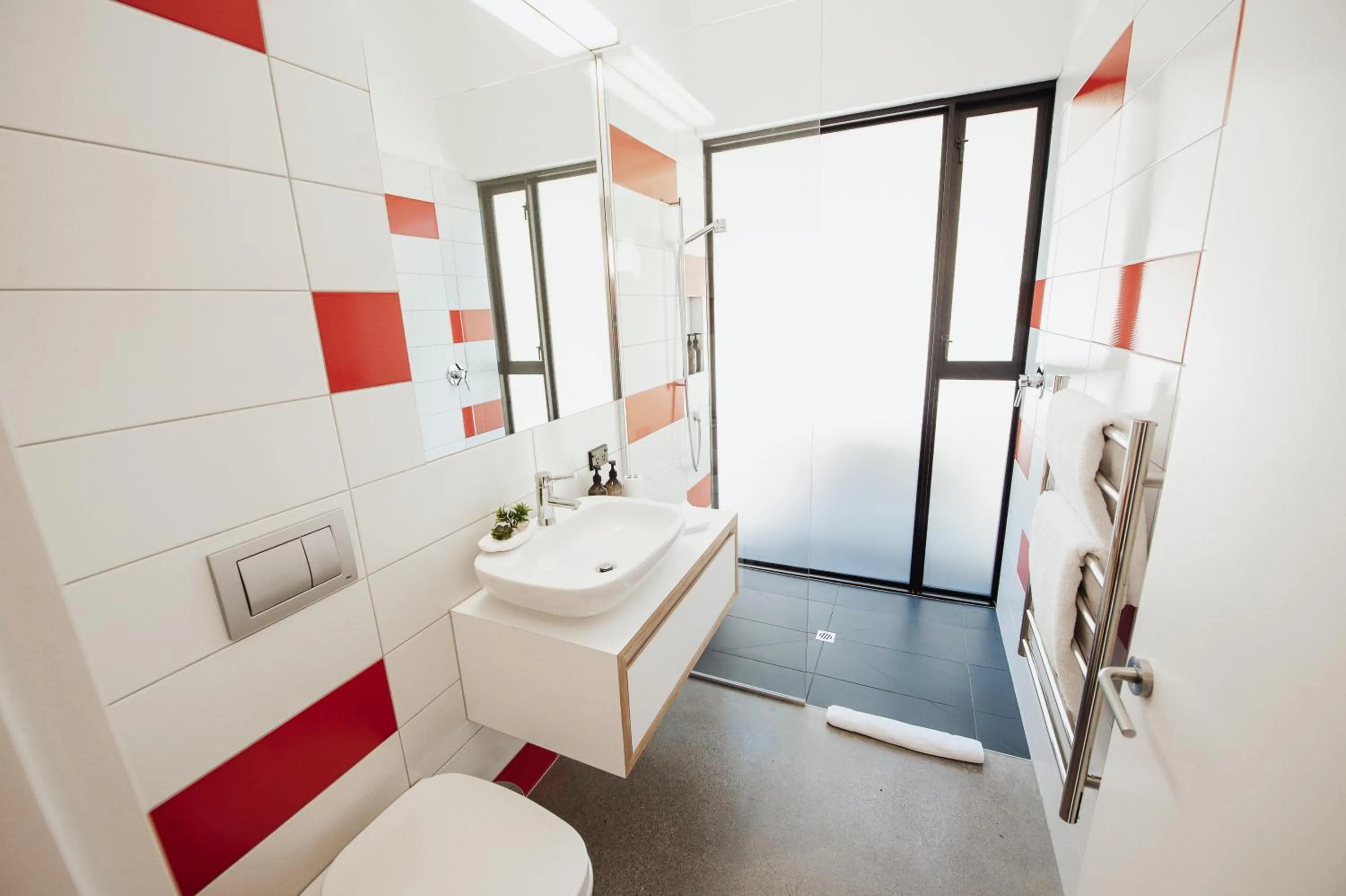 Toilet in Award-Winning Modern Retreat with Hot Tub & Views