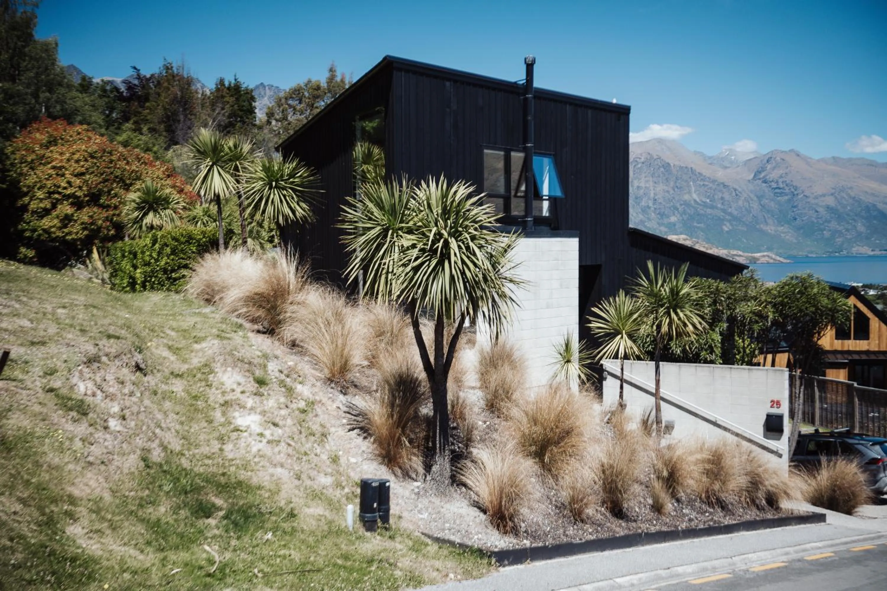 Property building in Award-Winning Modern Retreat with Hot Tub & Views
