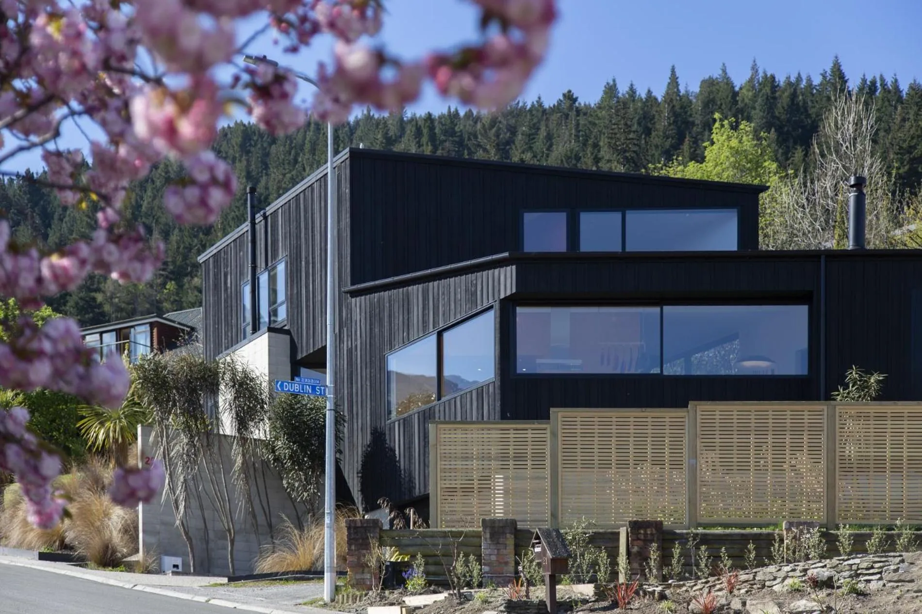 Property building in Award-Winning Modern Retreat with Hot Tub & Views