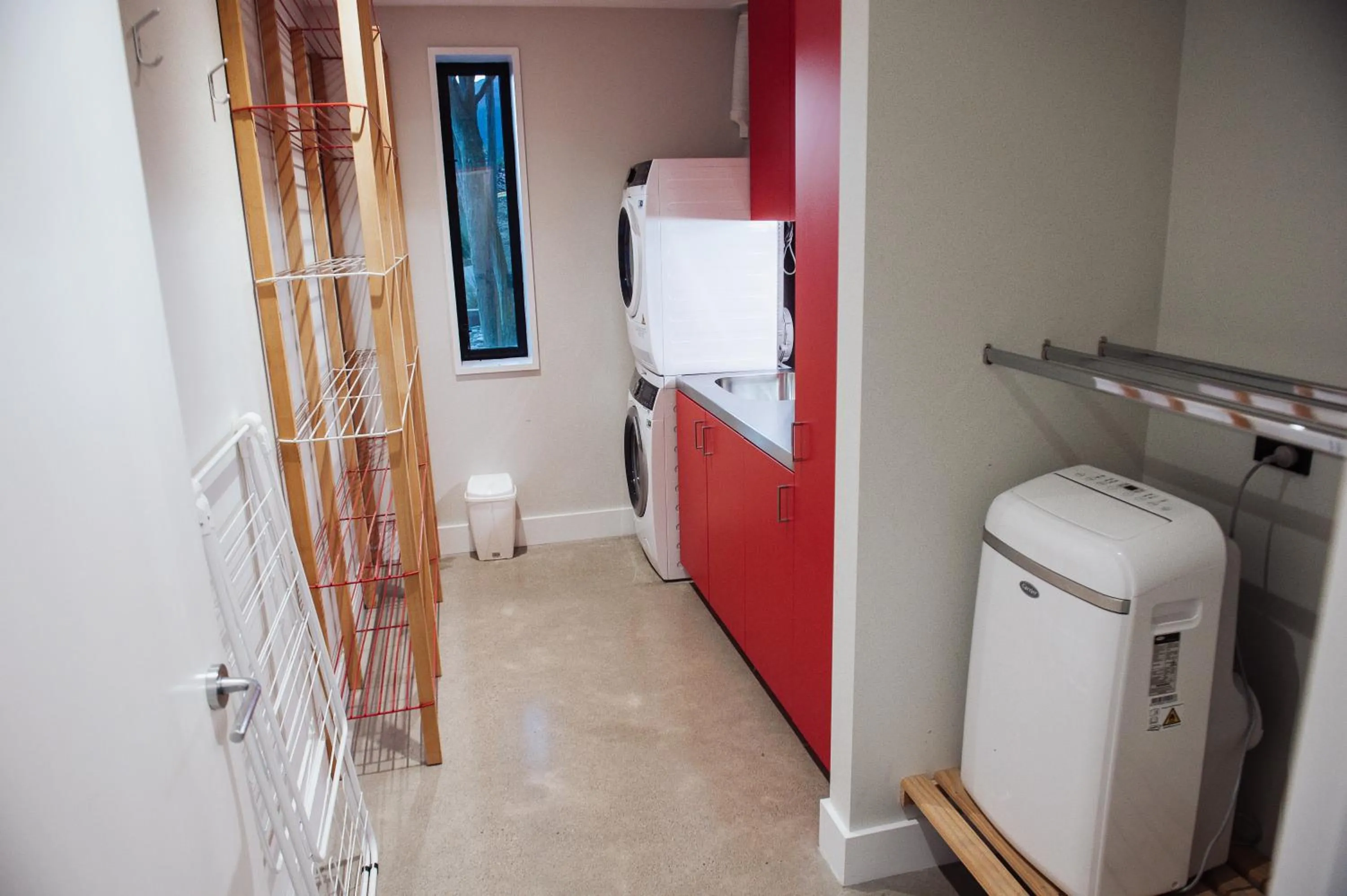laundry in Award-Winning Modern Retreat with Hot Tub & Views