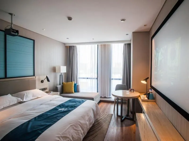 Bed in GreenTree EasternLianyungang Wanda Plaza Hotel