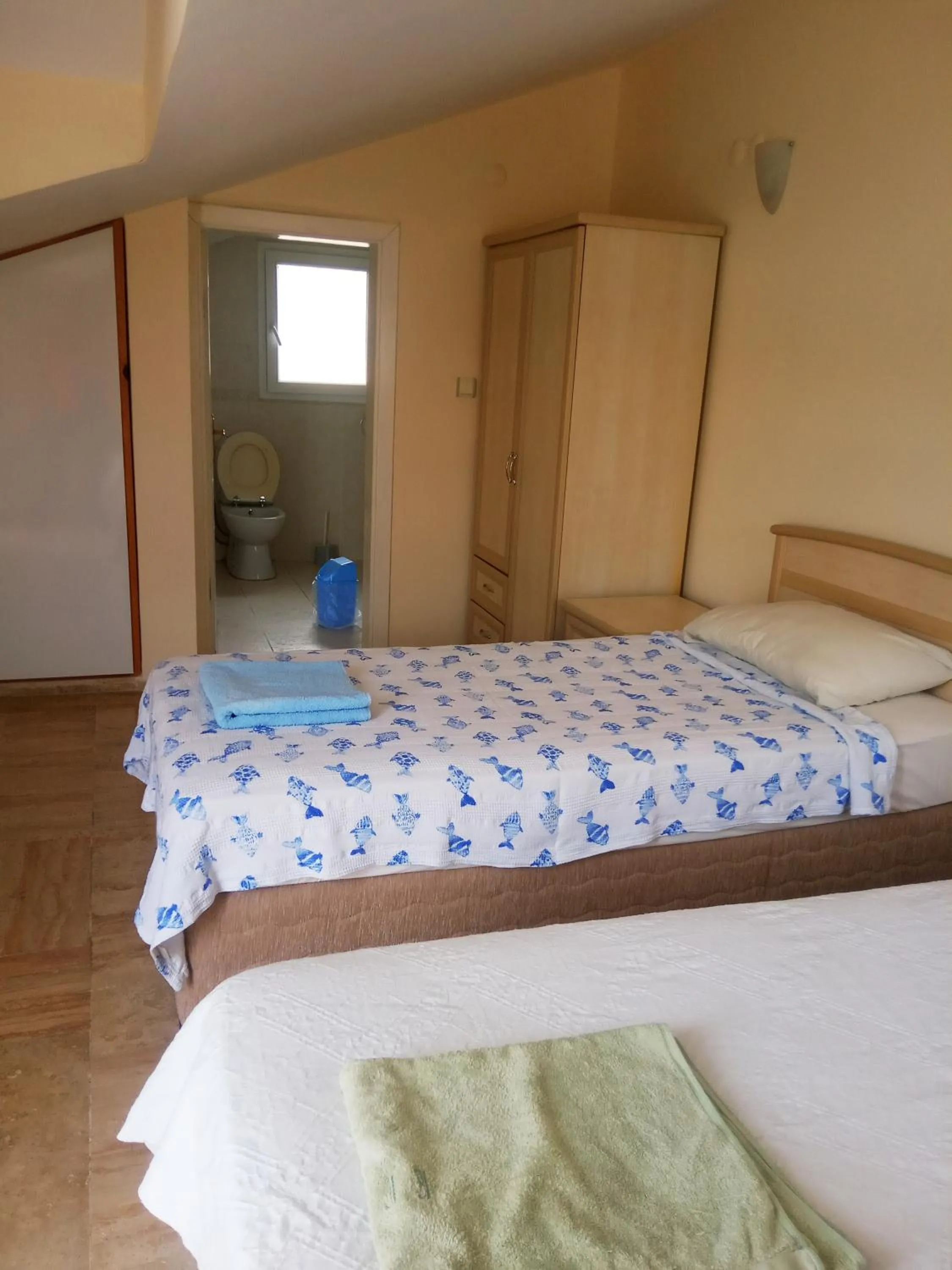 Bed in Dove Apart Hotel