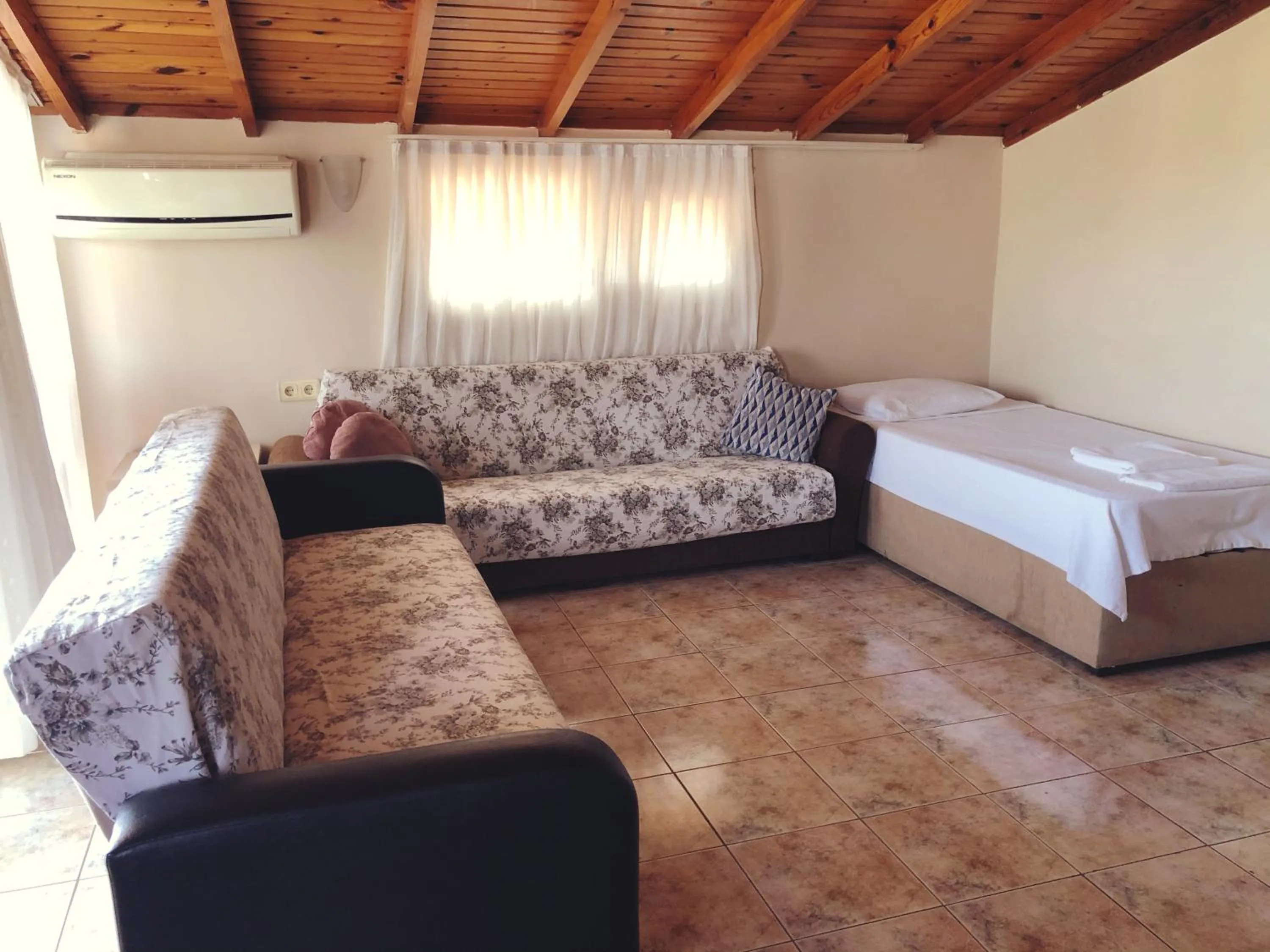 Bed in Dove Apart Hotel