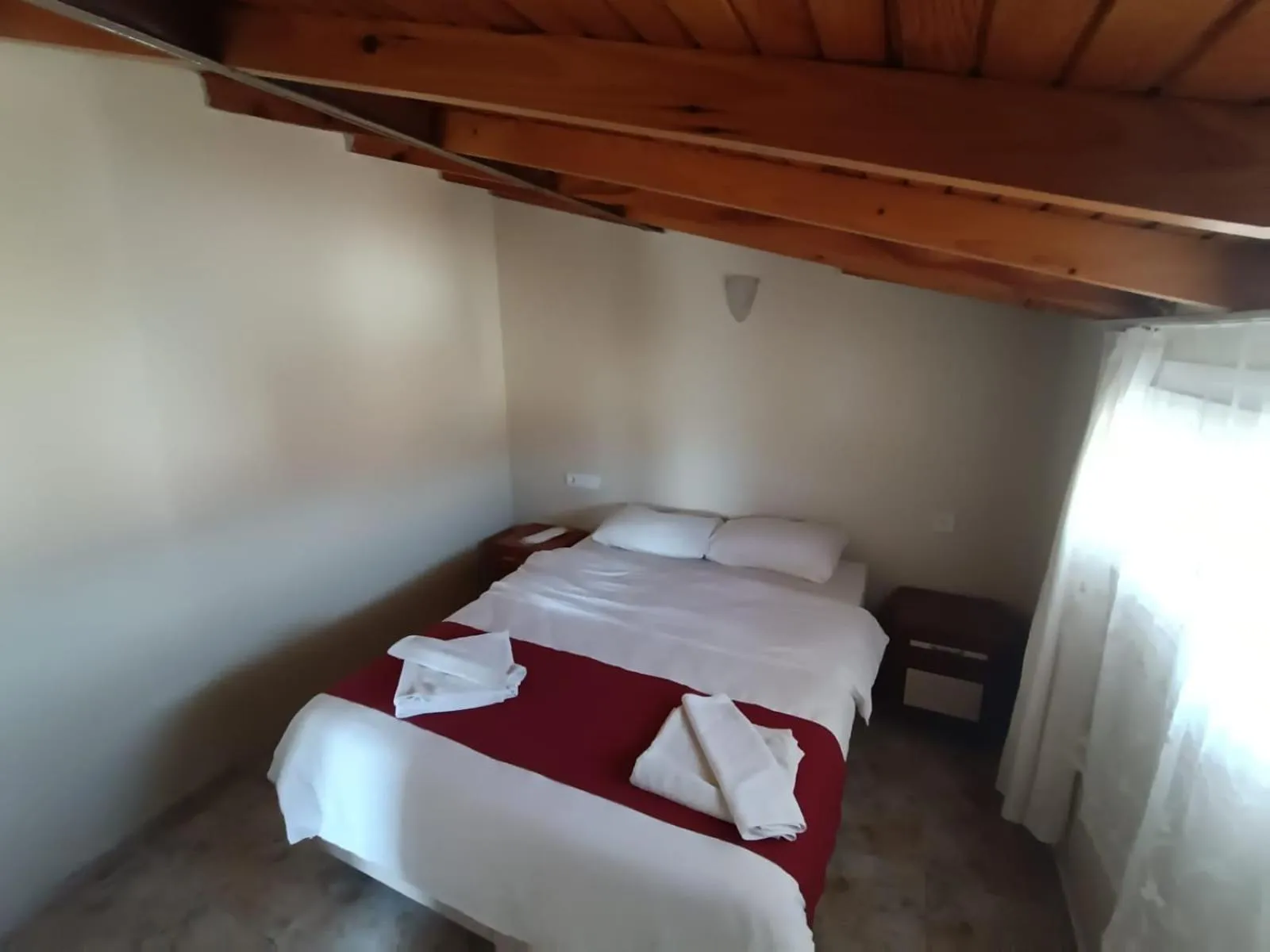 Bed in Dove Apart Hotel