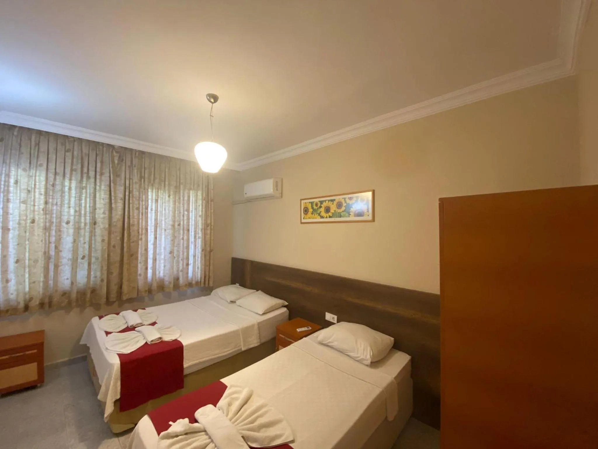 Bed in Dove Apart Hotel