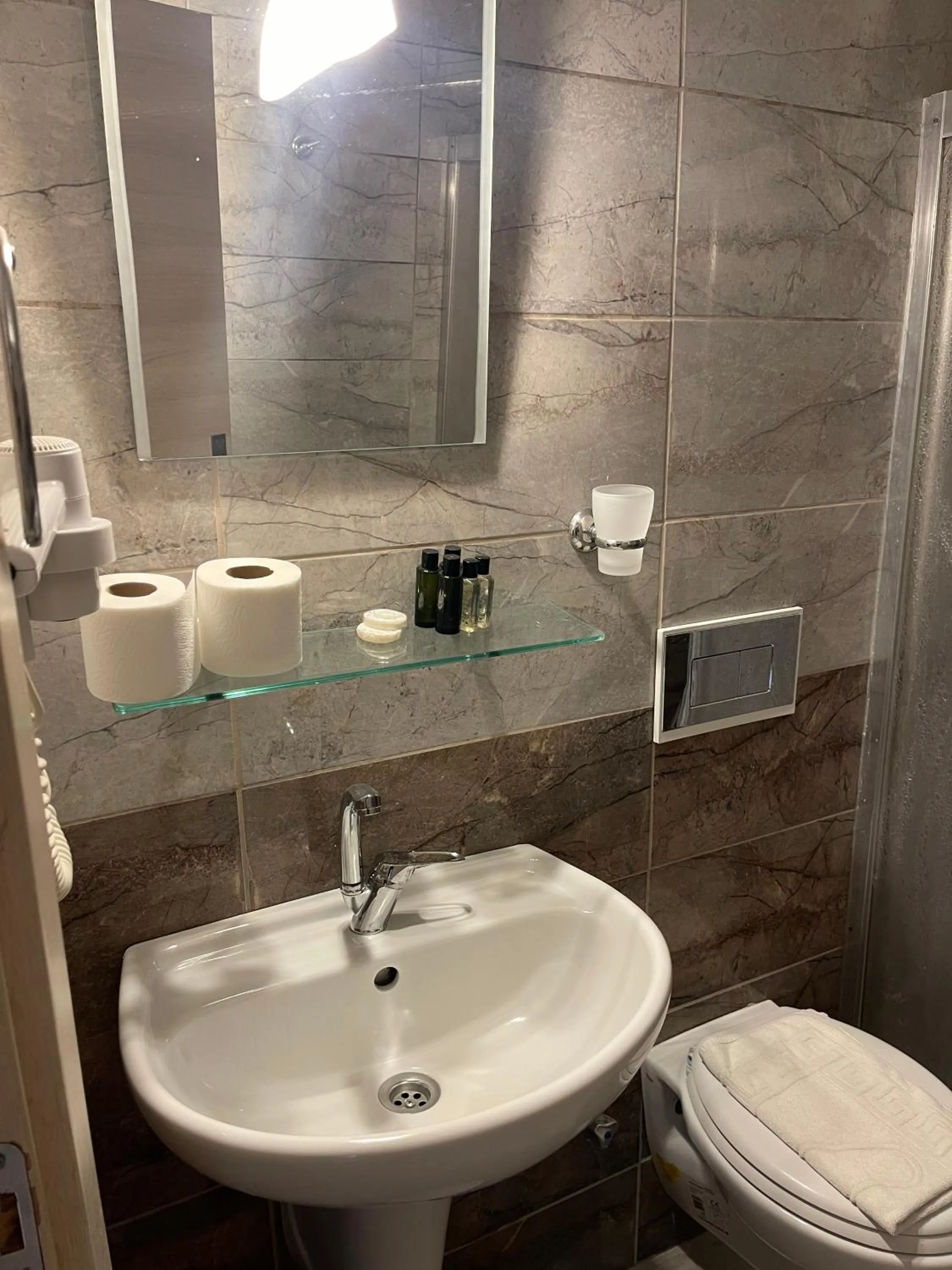 Toilet in Dove Apart Hotel