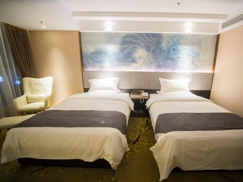 Bed in GreenTree Eastern Jingde Town Railway Station Hotel