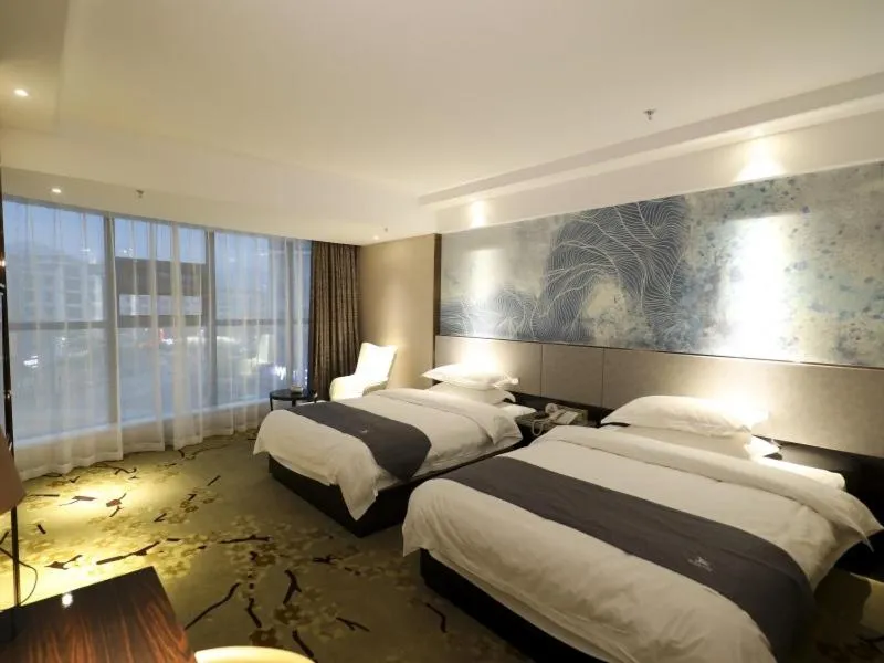 Bed in GreenTree Eastern Jingde Town Railway Station Hotel