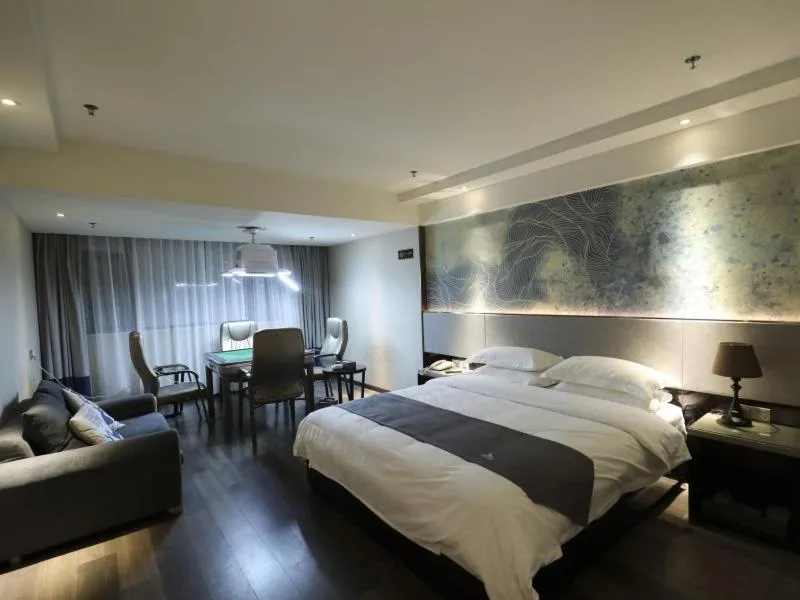 Bed in GreenTree Eastern Jingde Town Railway Station Hotel