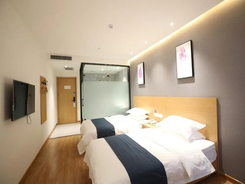 Bed in Shell Xinzheng Airport Port Huaxia Avenue Hotel