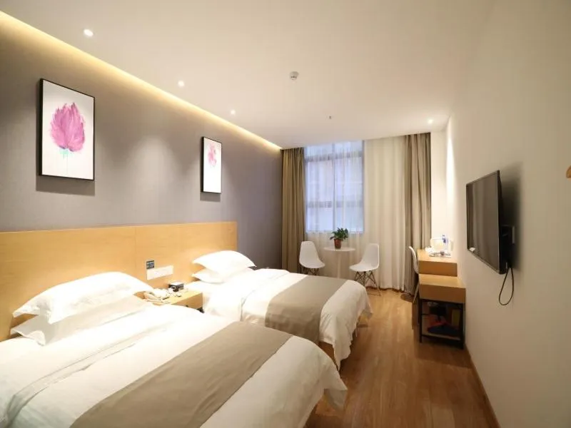 Bed in Shell Xinzheng Airport Port Huaxia Avenue Hotel