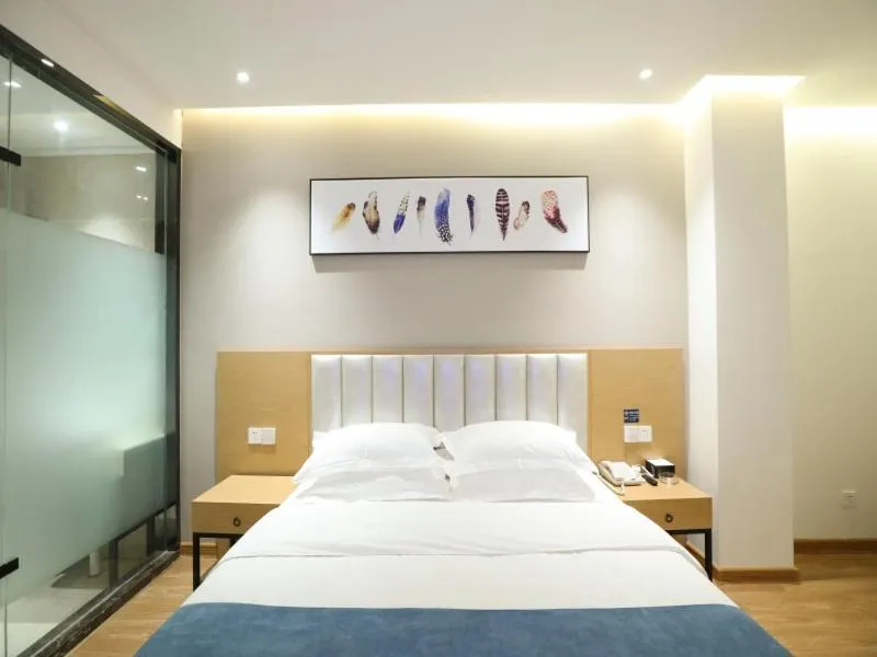 Bed in Shell Xinzheng Airport Port Huaxia Avenue Hotel