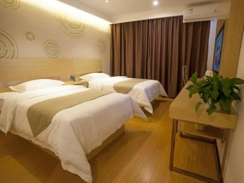 Bed in GreenTree Inn Zhangjiakou City Chicheng County Xiacheng Avenue Oriental Yijing Express Hotel