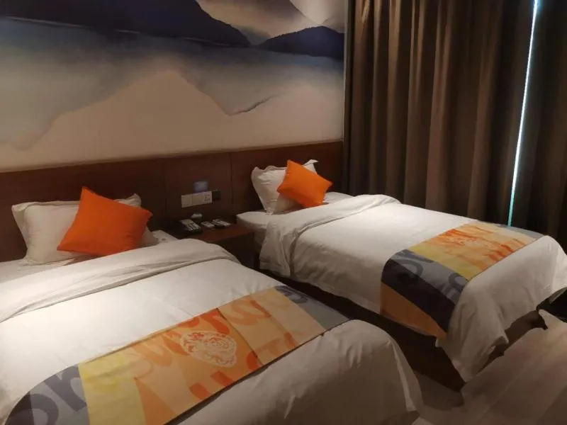 Bed in Shell Liaocheng Linqing City Bus Station Hotel