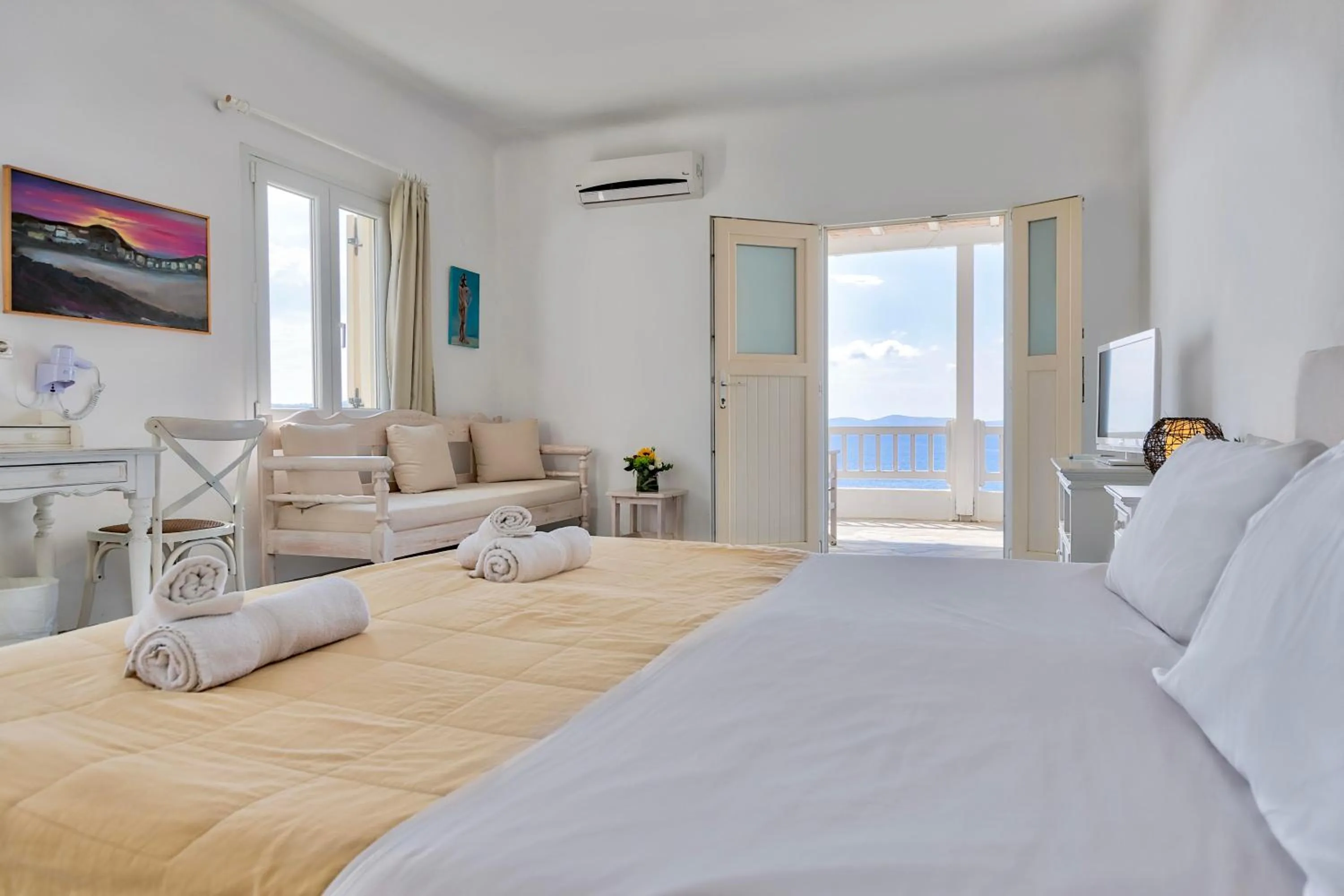 Bed in With-inn Mykonos Suites