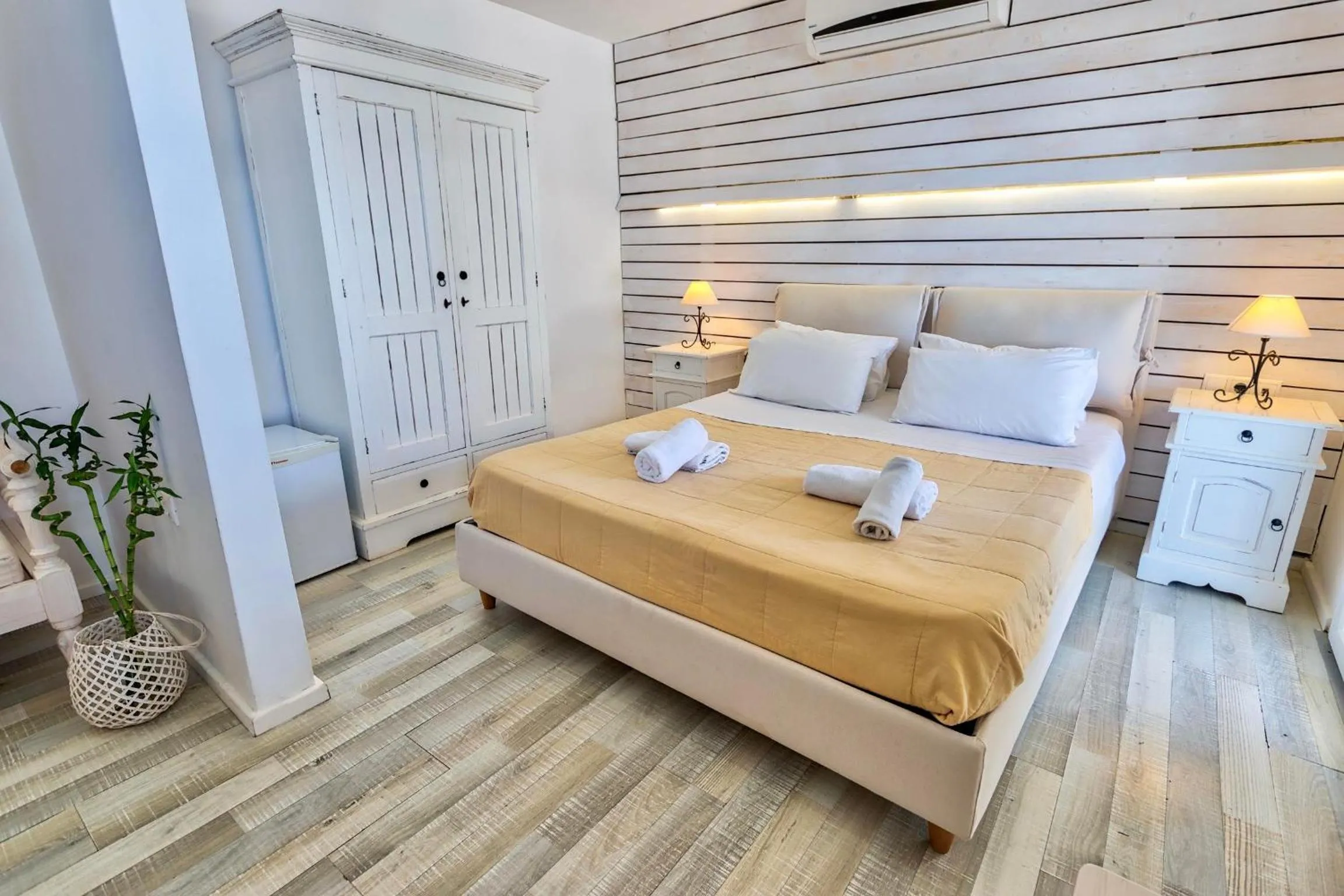 Bed in With-inn Mykonos Suites