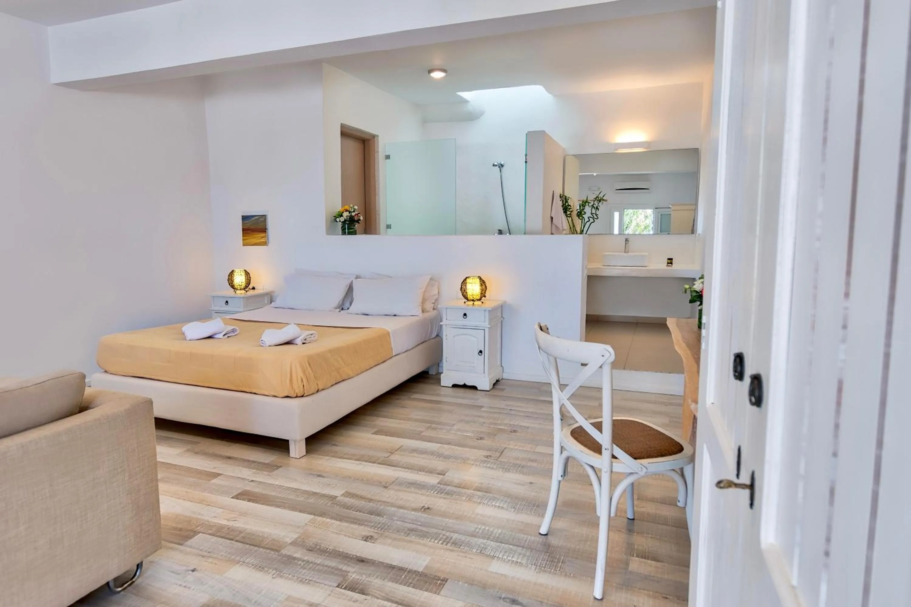 Bed in With-inn Mykonos Suites