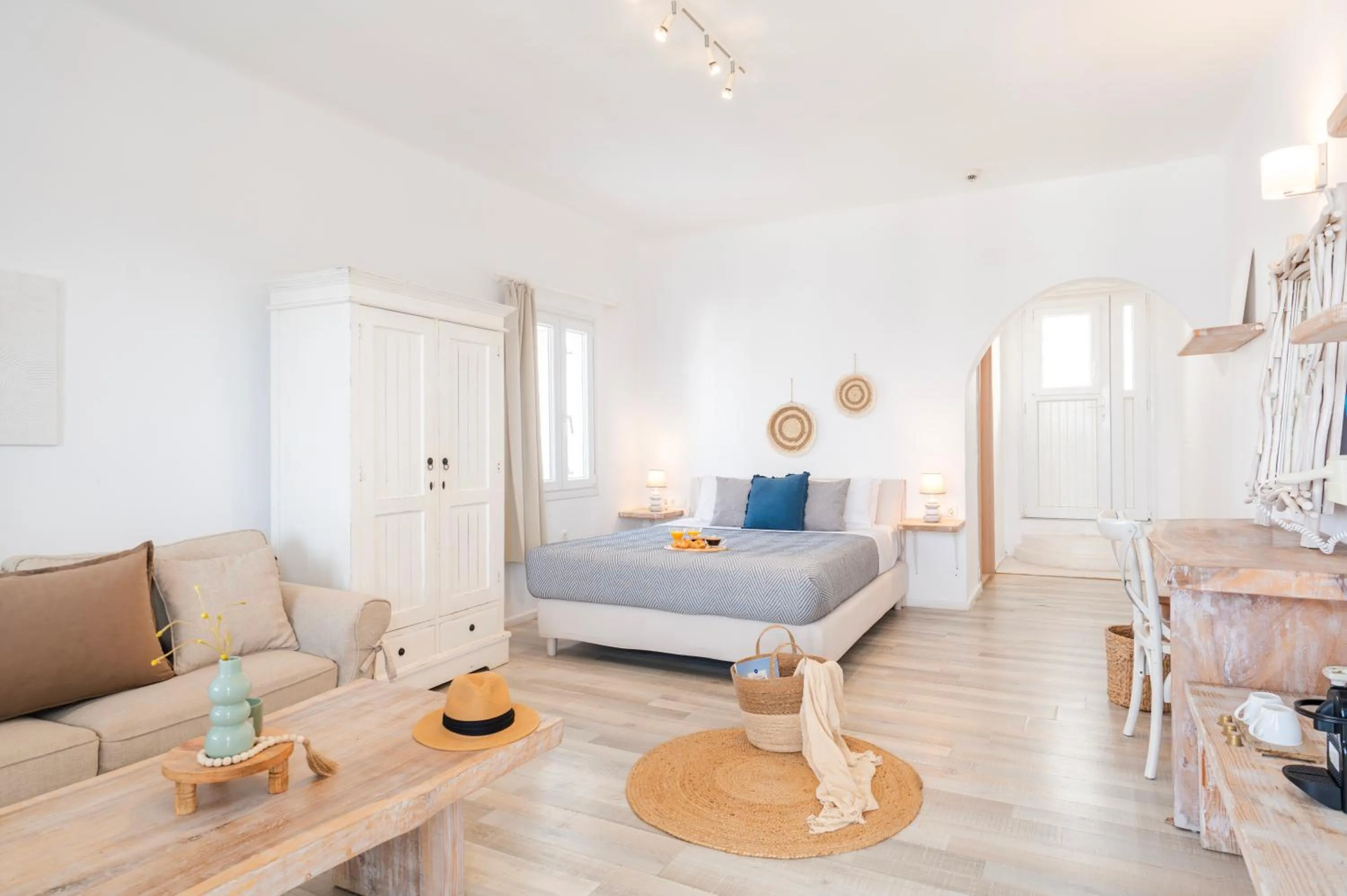 Bed in With-inn Mykonos Suites