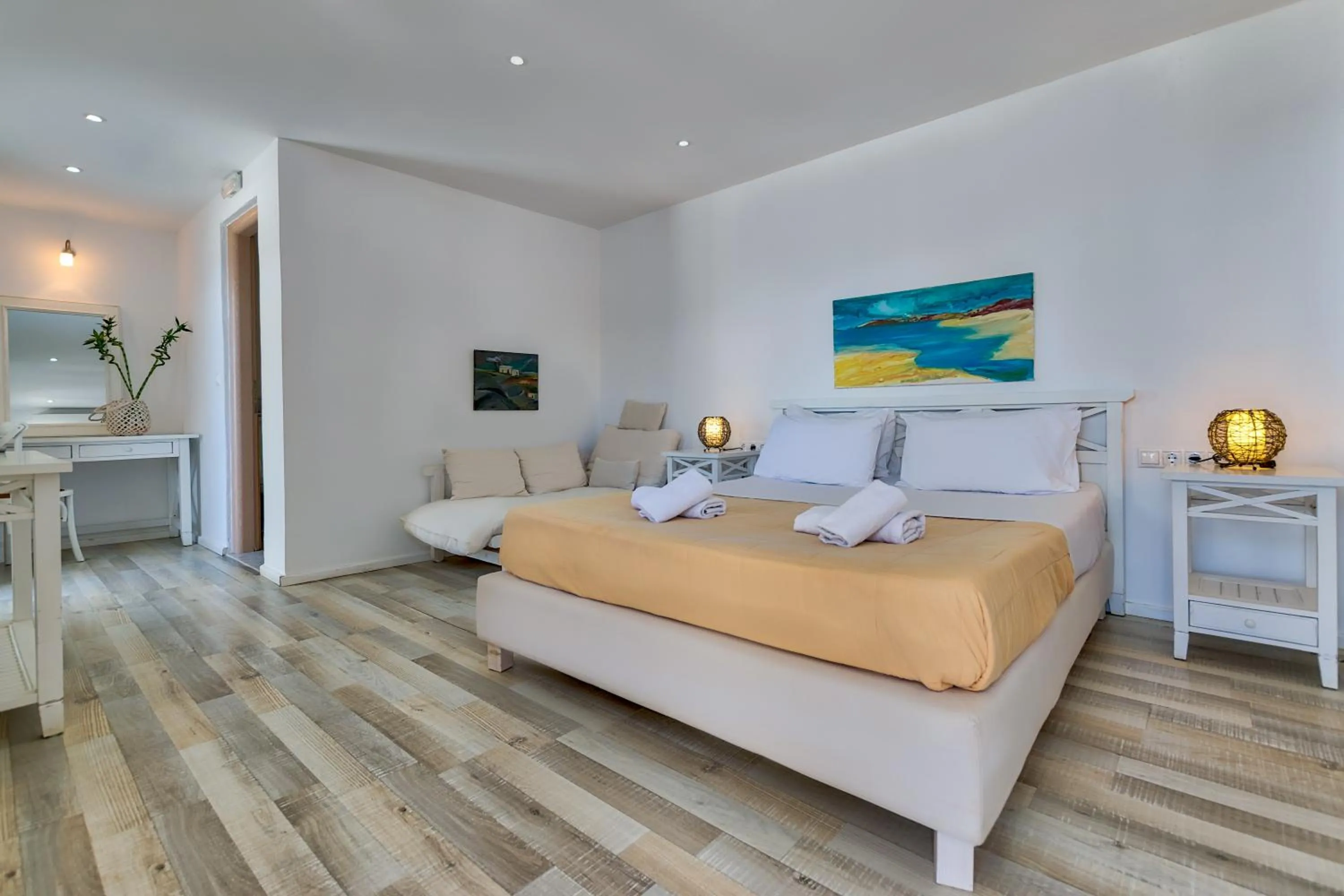 Bed in With-inn Mykonos Suites