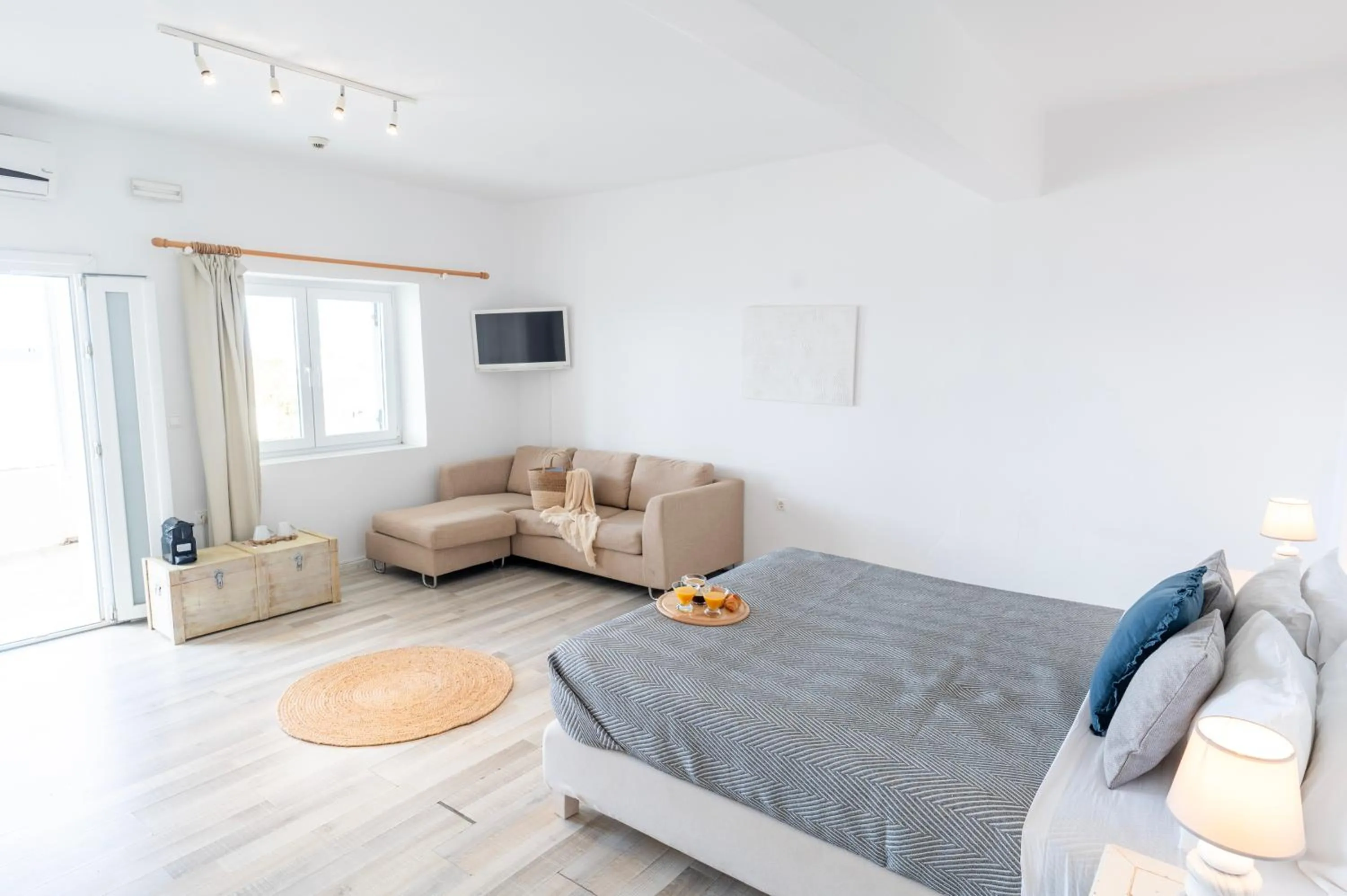 Bed in With-inn Mykonos Suites