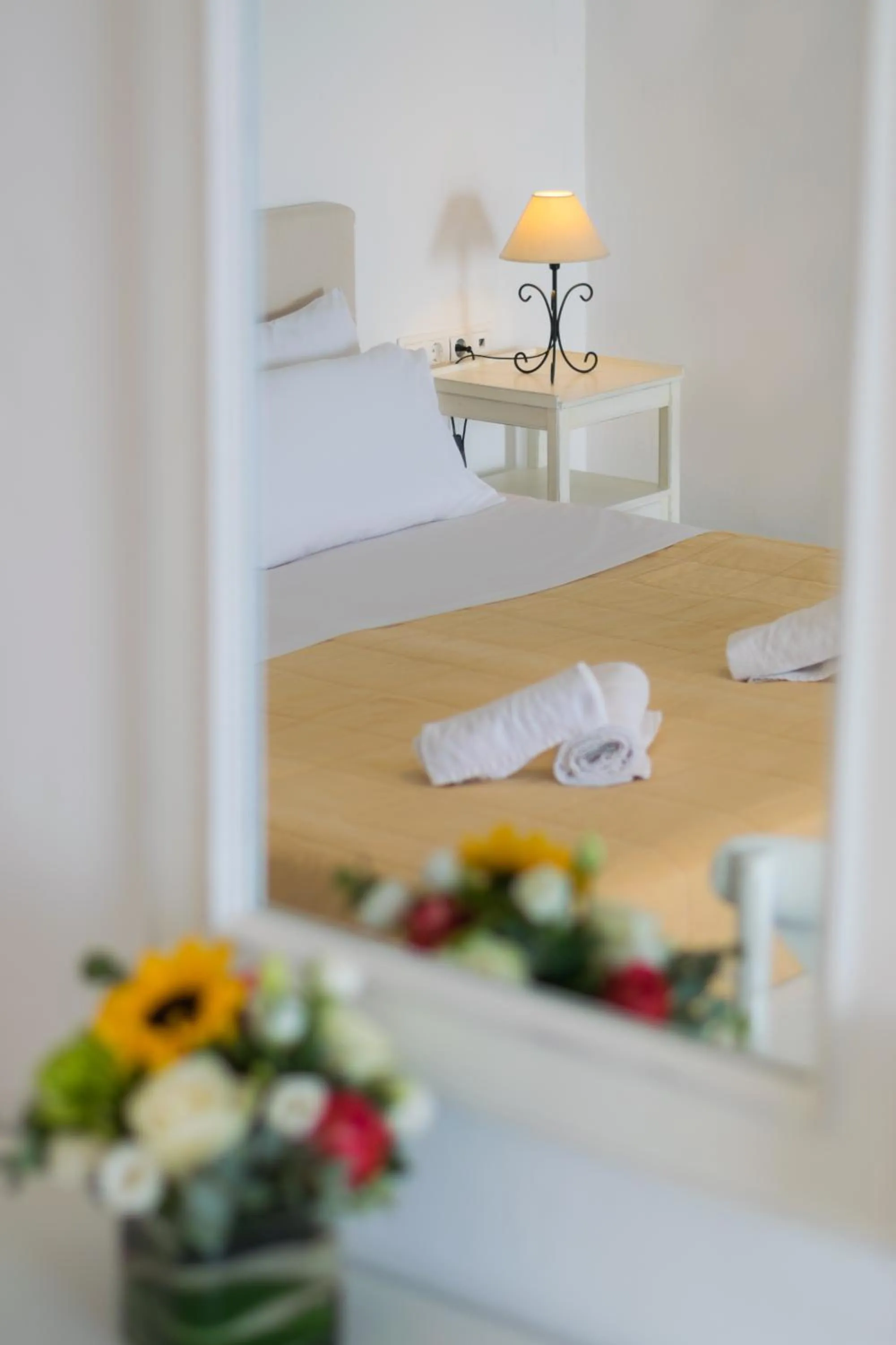 Bed in With-inn Mykonos Suites