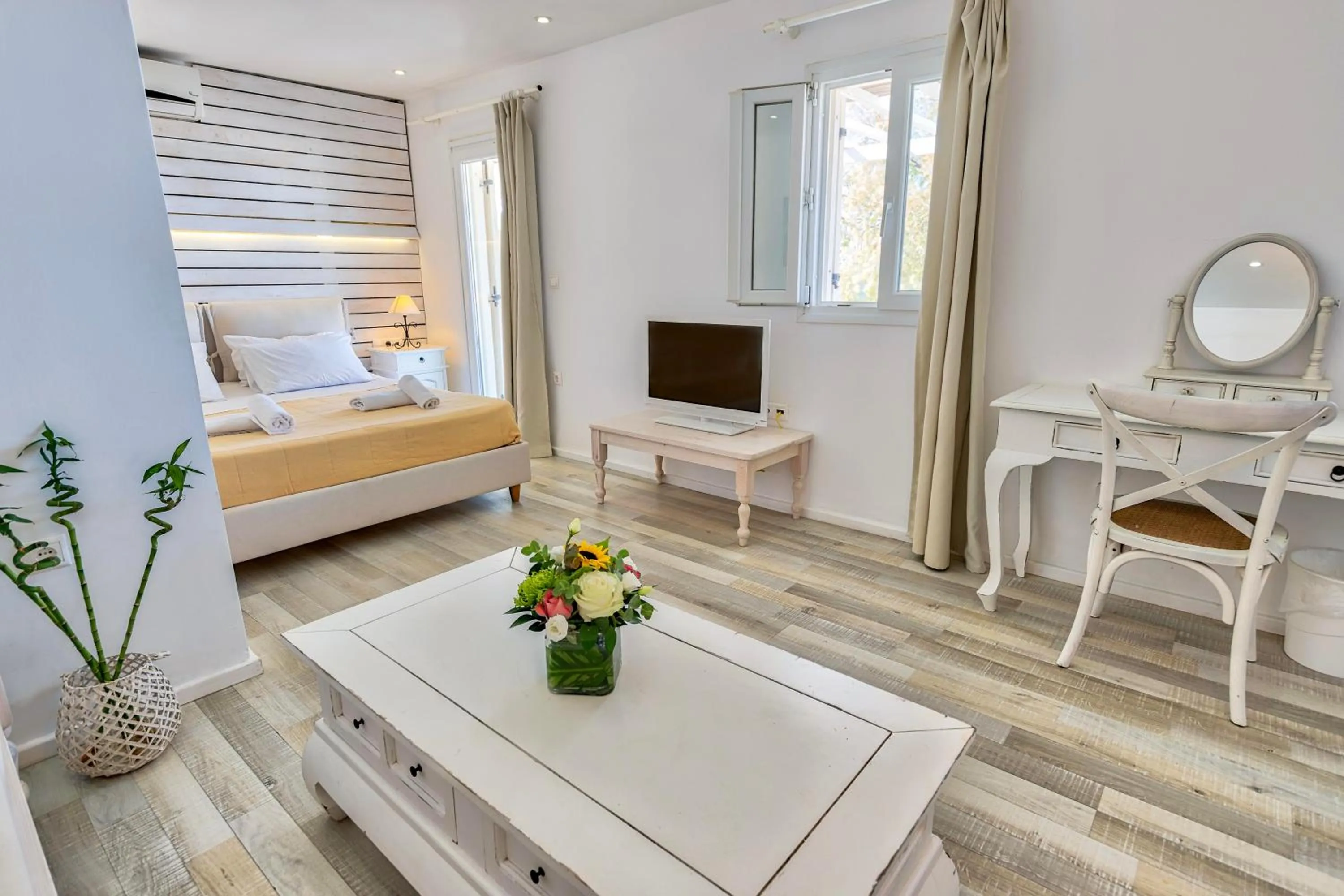 Bed in With-inn Mykonos Suites