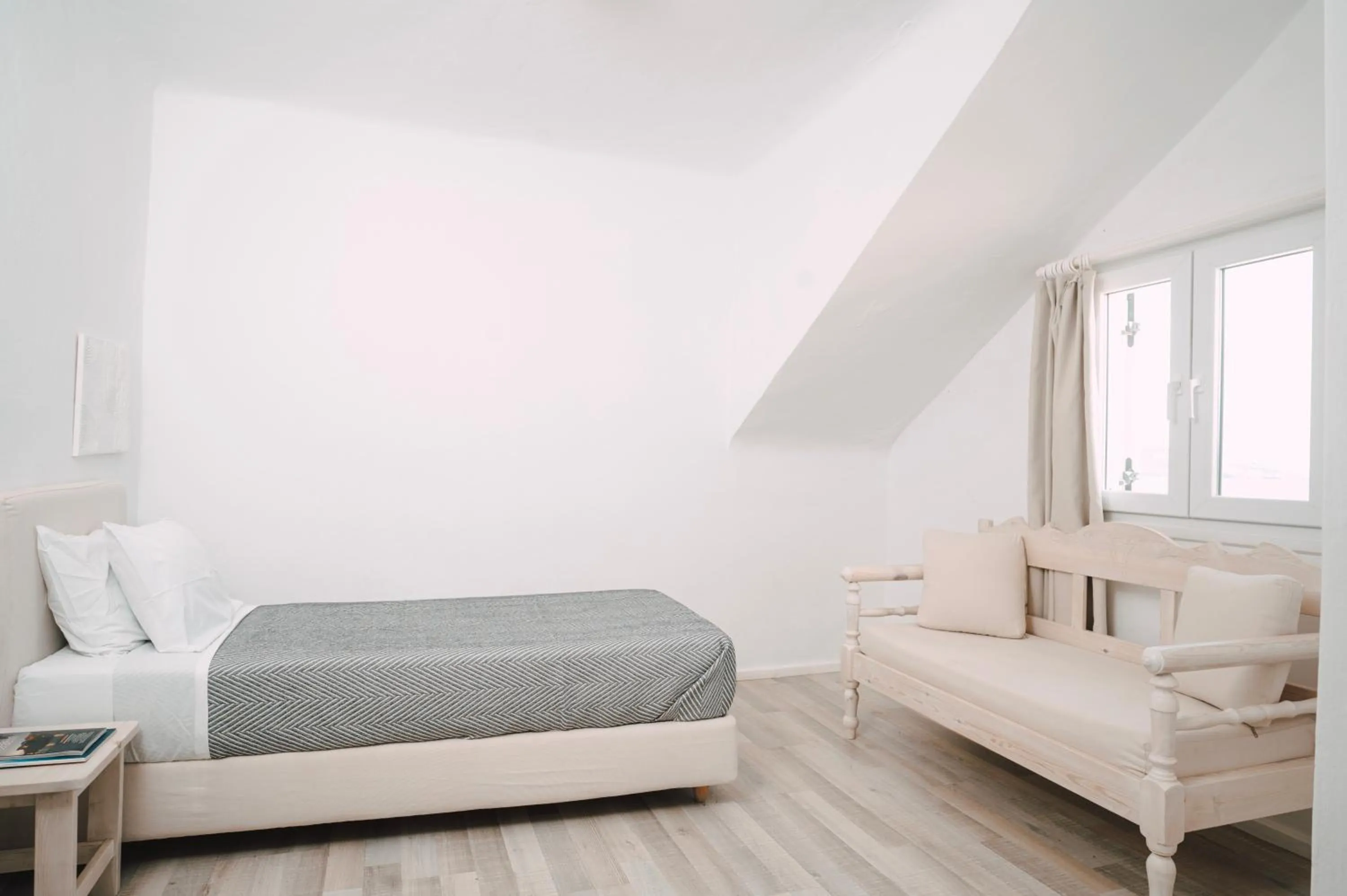 Bed in With-inn Mykonos Suites