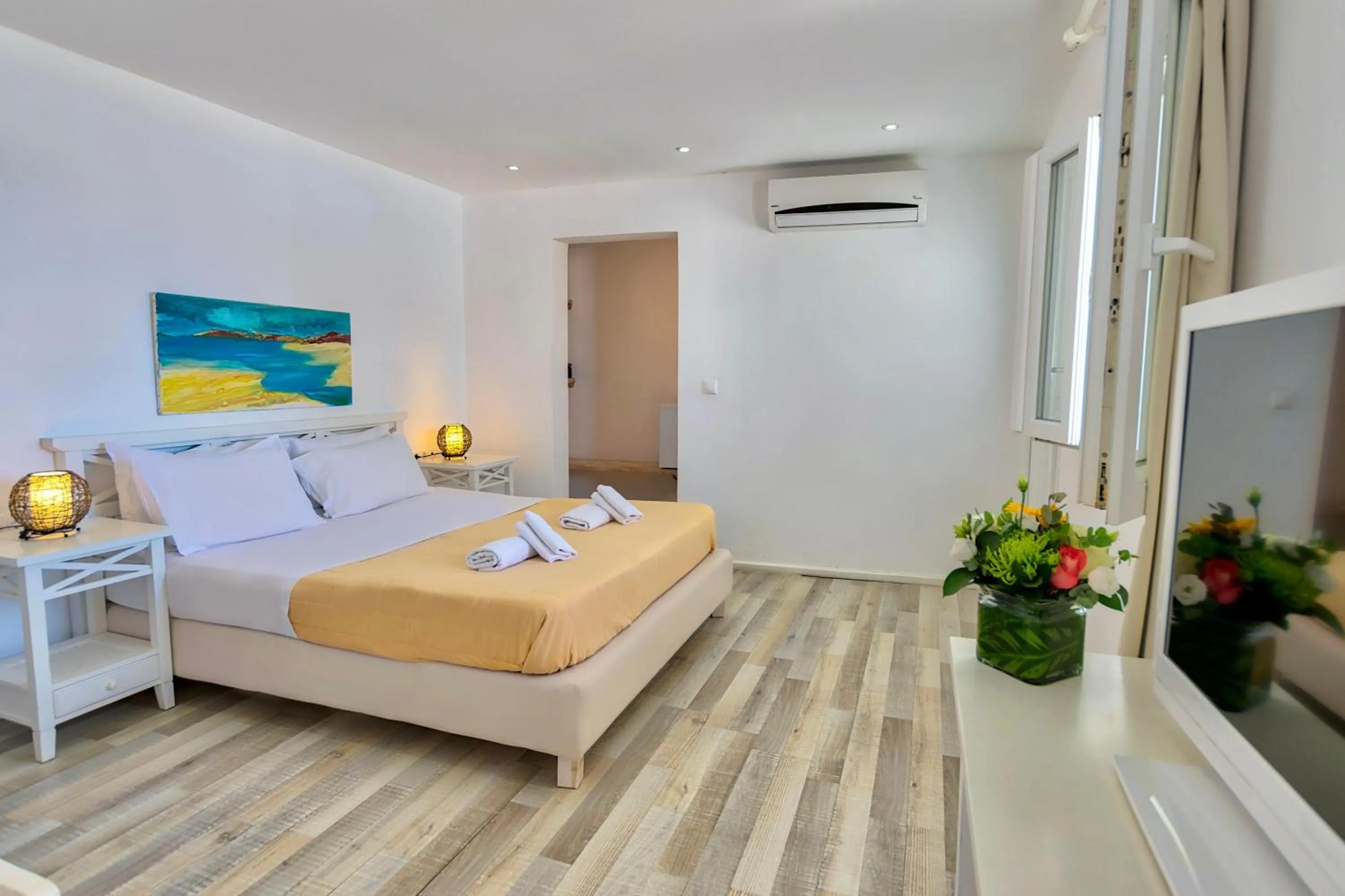 Bed in With-inn Mykonos Suites