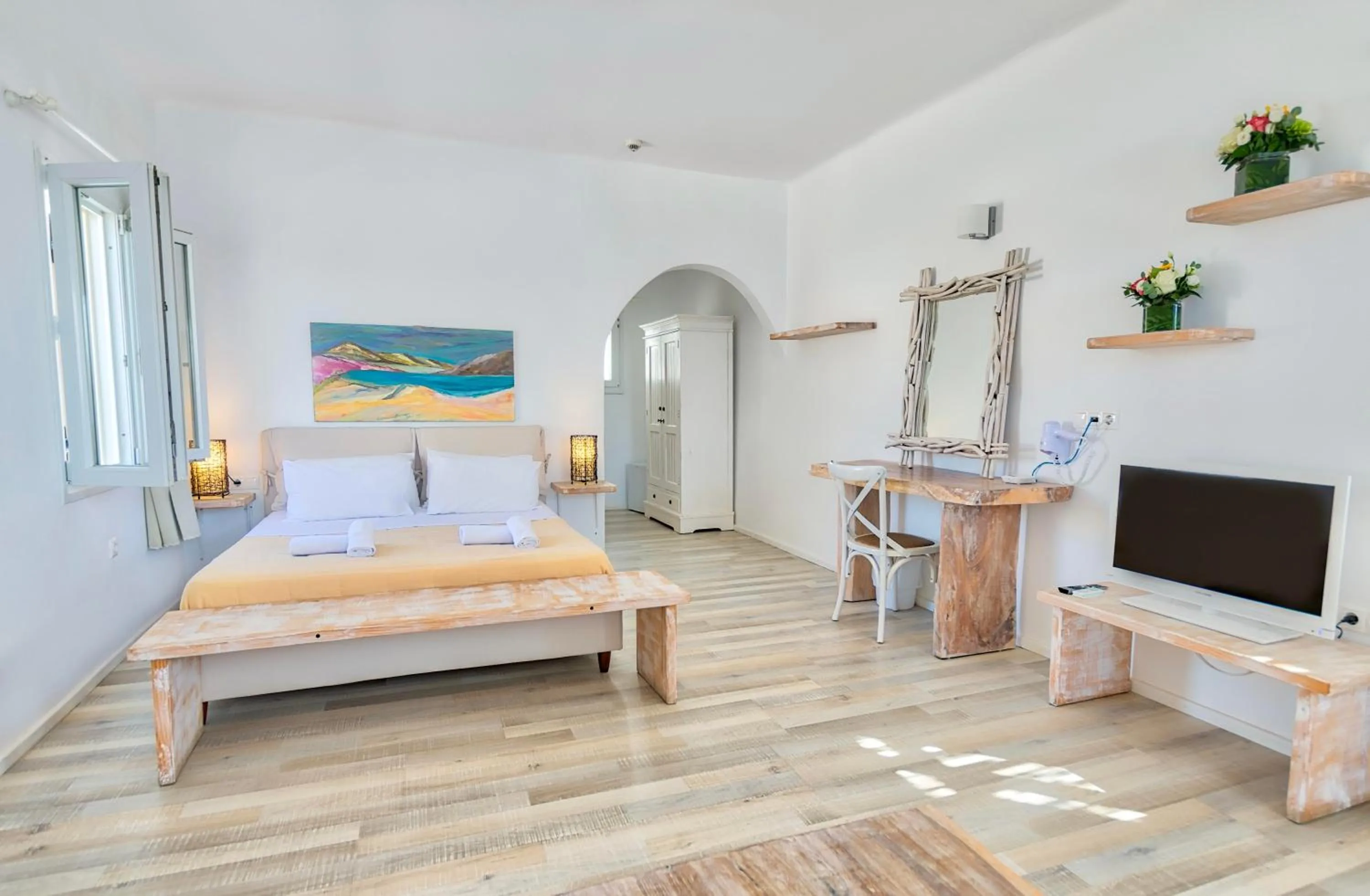 Bed in With-inn Mykonos Suites