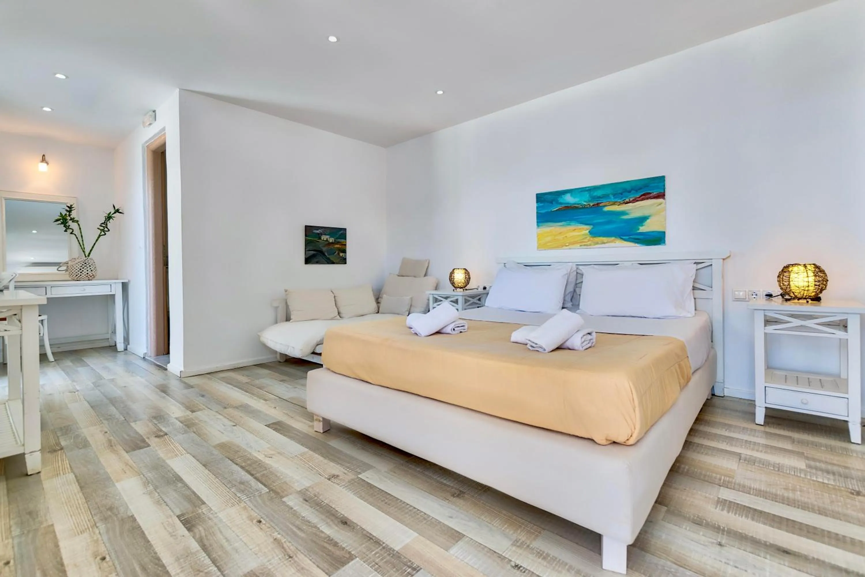 Bed in With-inn Mykonos Suites