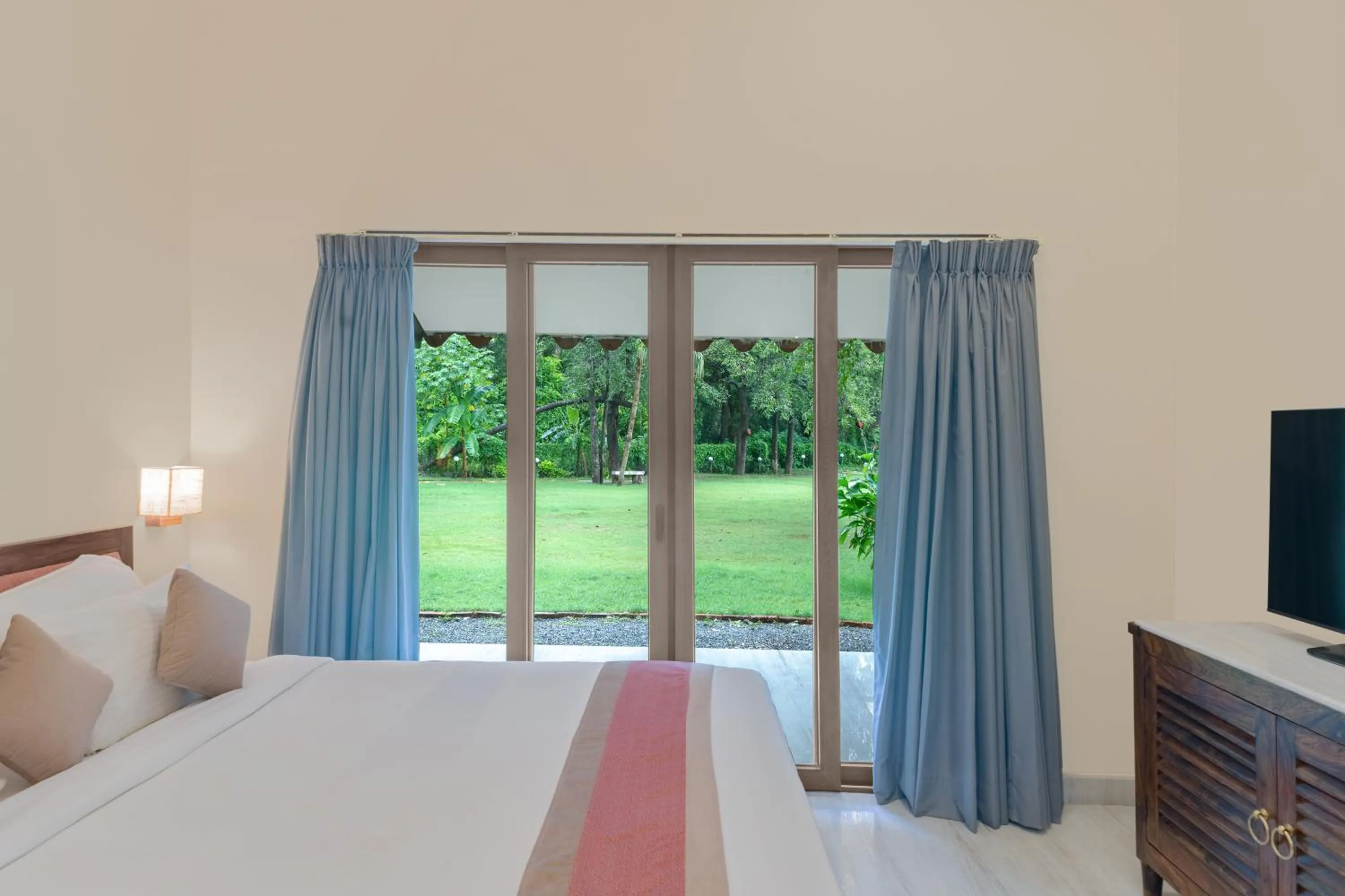 Garden view, Bed in Aranya Vilas - A Nature Resort