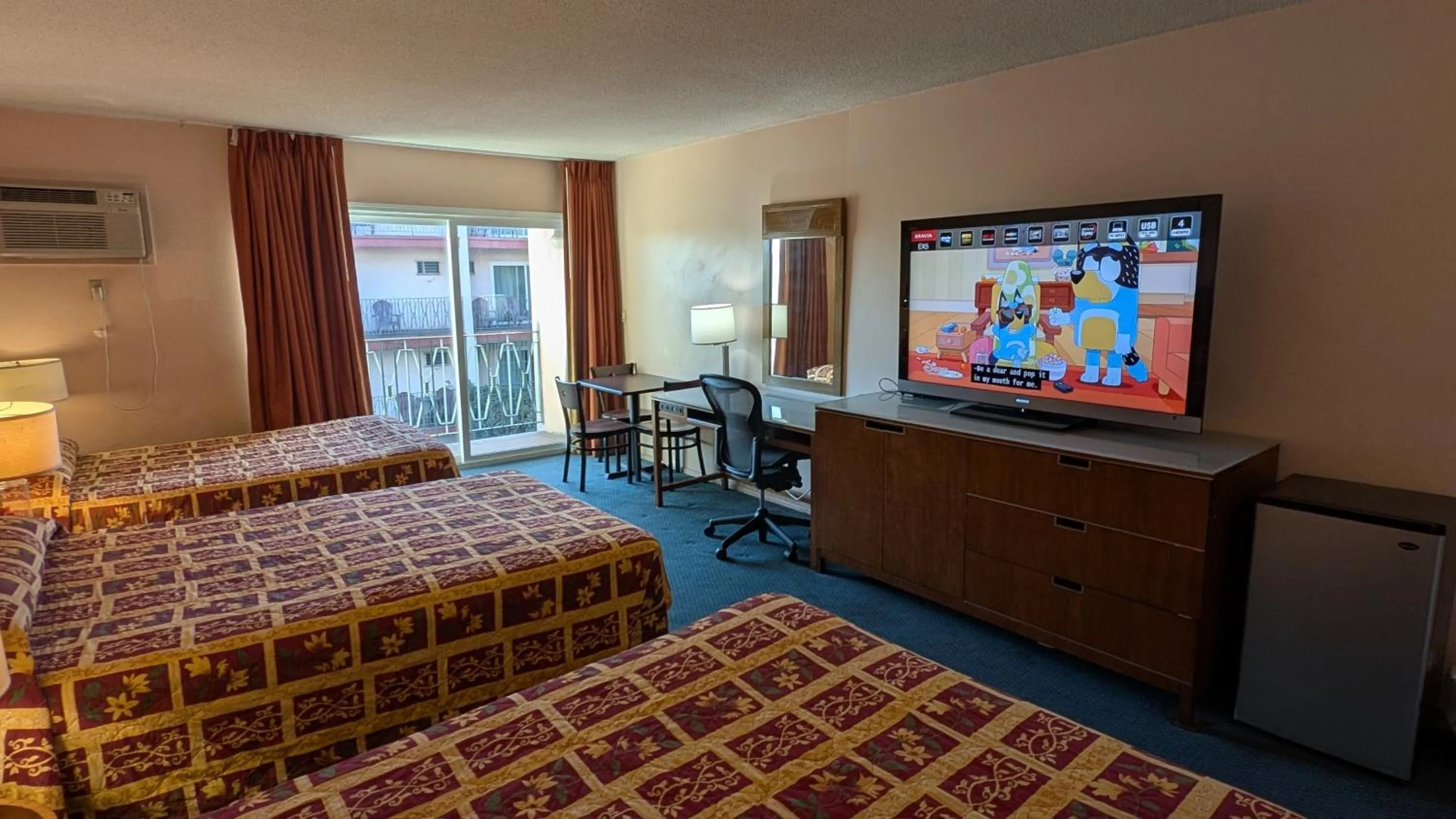 Bed in Royal Century Hotel at LAX