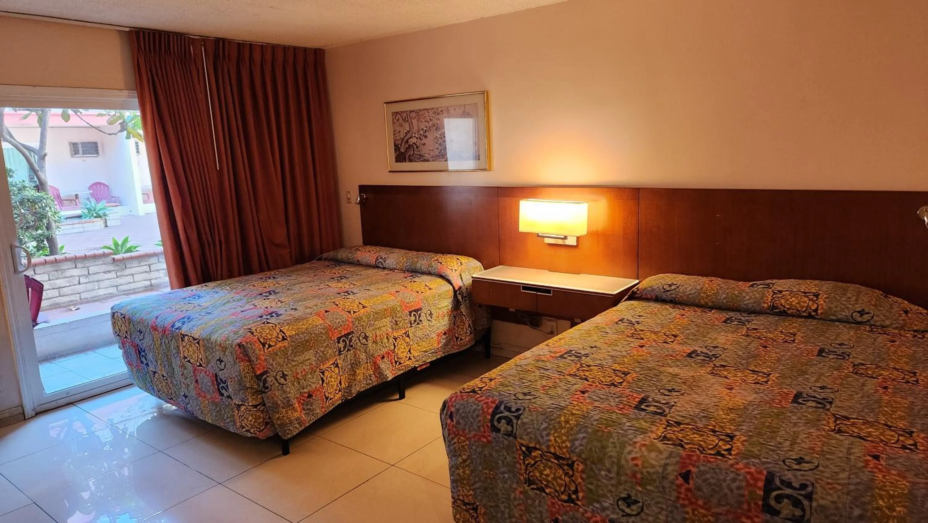 Bed in Royal Century Hotel at LAX