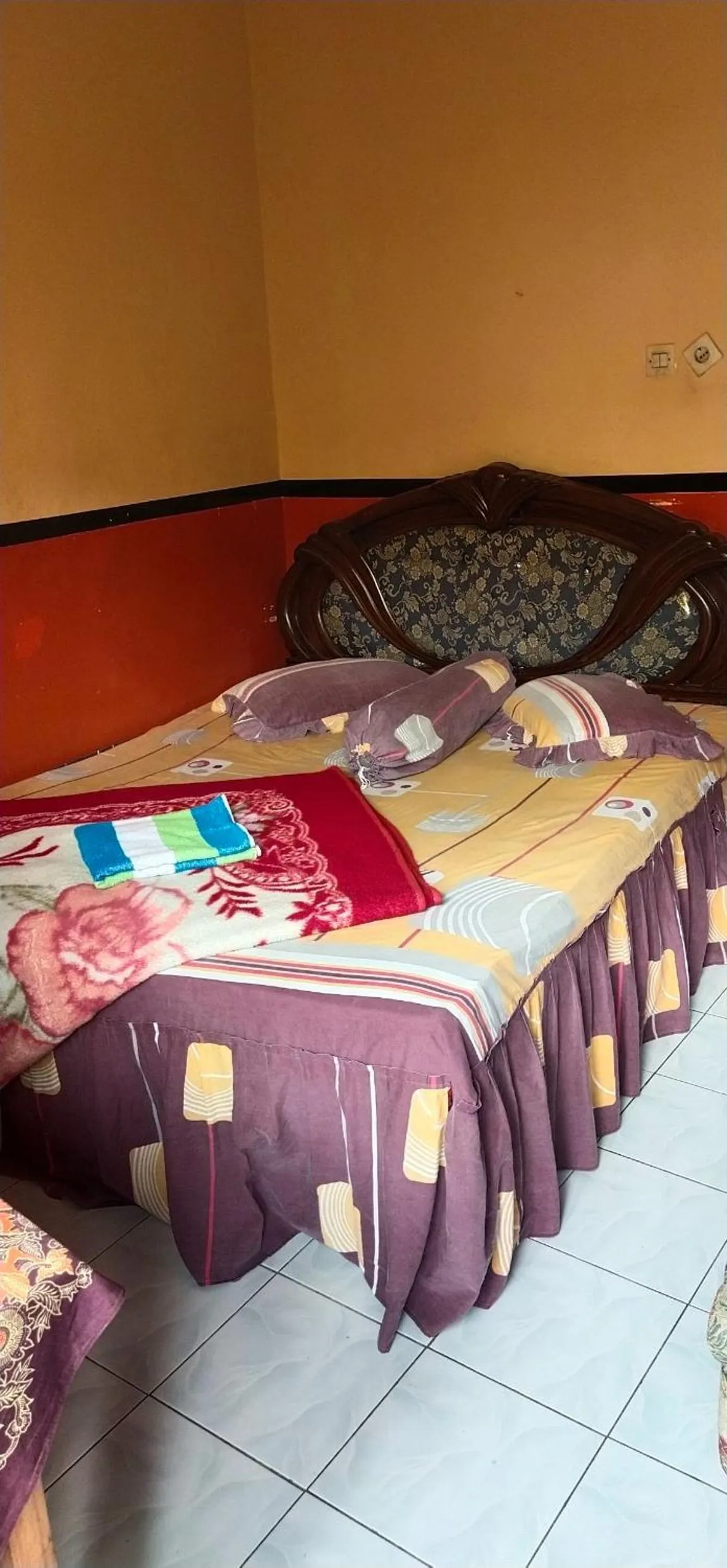 Photo of the whole room, Bed in Penginapan Indah Lestari