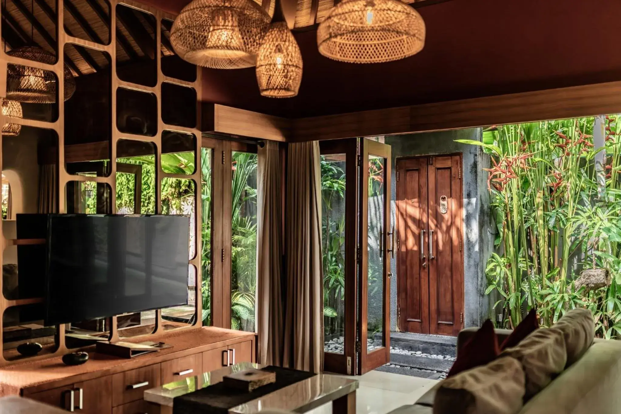 Living room in Seminyak Sanctuary Villa by Ini Vie Hospitality Living room in Seminyak Sanctuary Villa by Ini Vie Hospitality