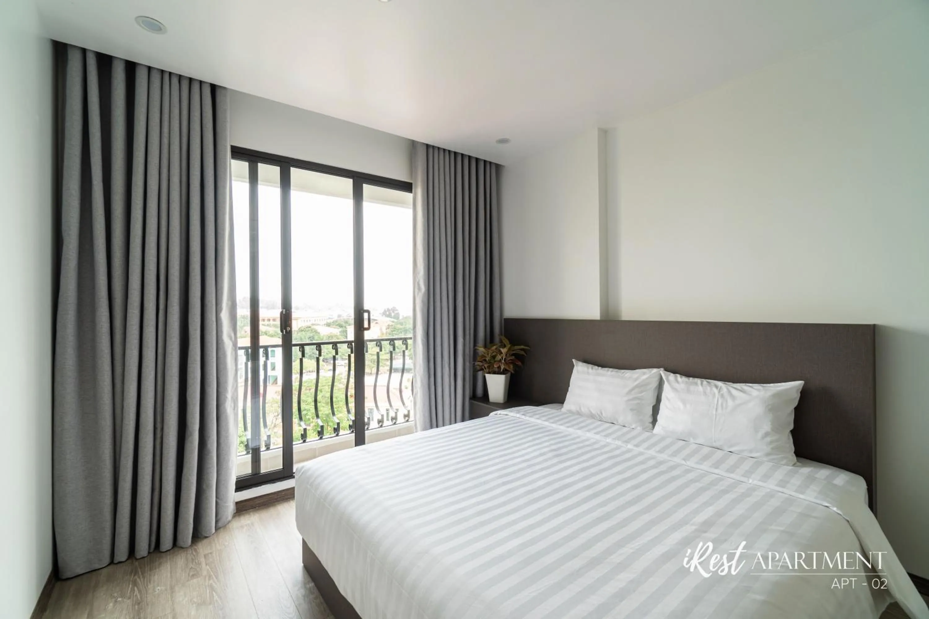 Bed in iRest Apartment Vinh Yen