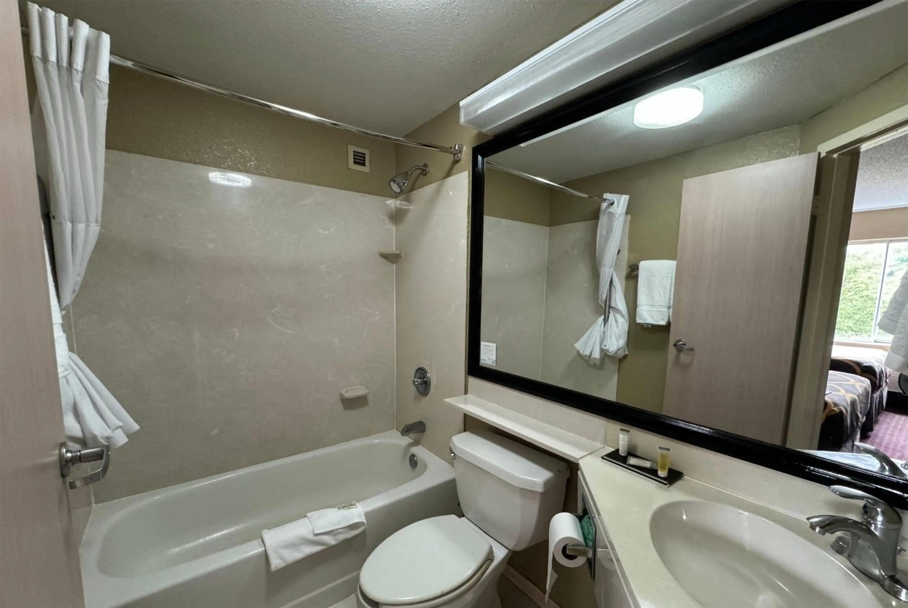 Bathroom in Super 8 by Wyndham New Cumberland