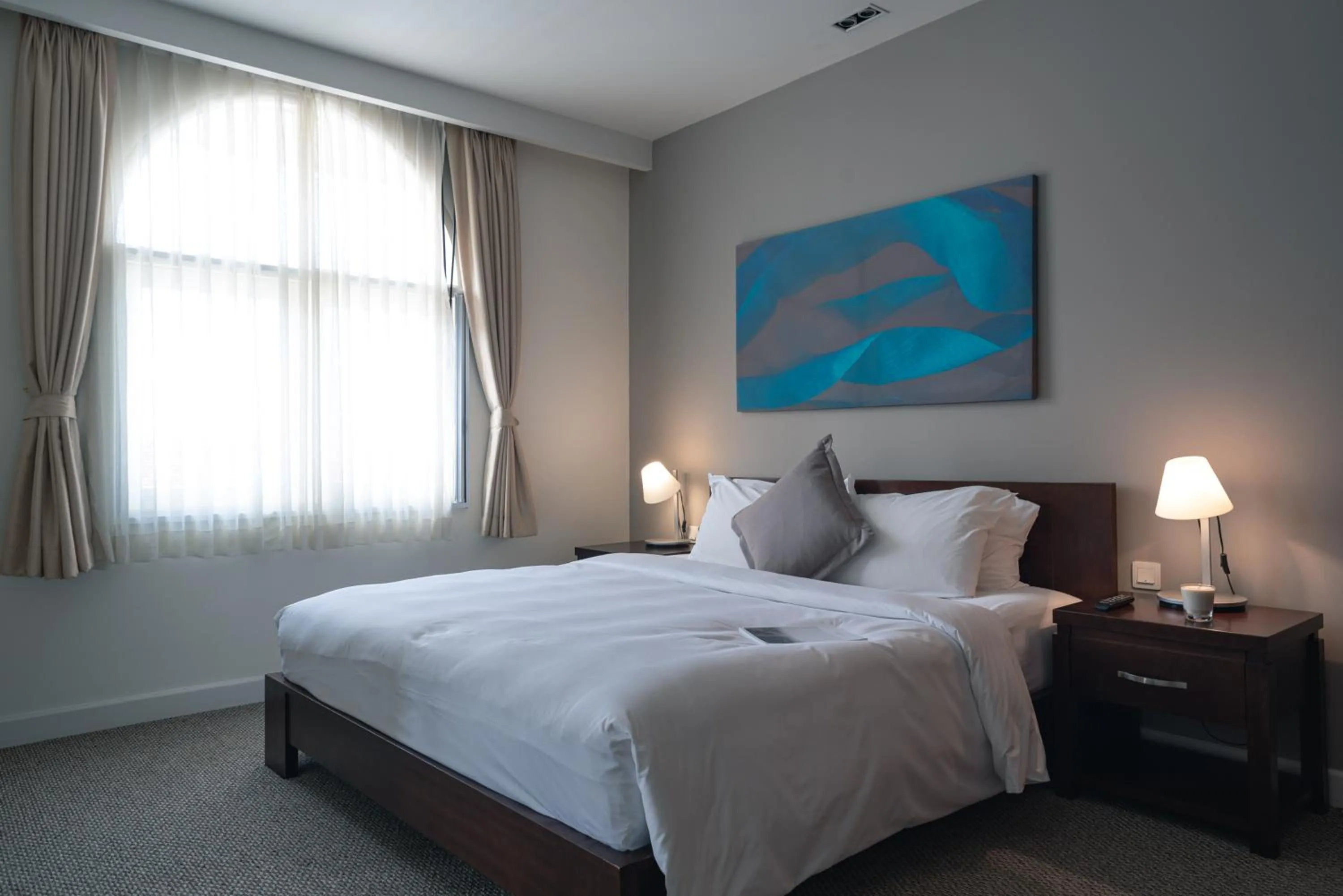 Bed in Central Mansions Serviced Apartments